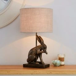 Dunelm Hare Licking Paw Table Lamp Ant Brs
